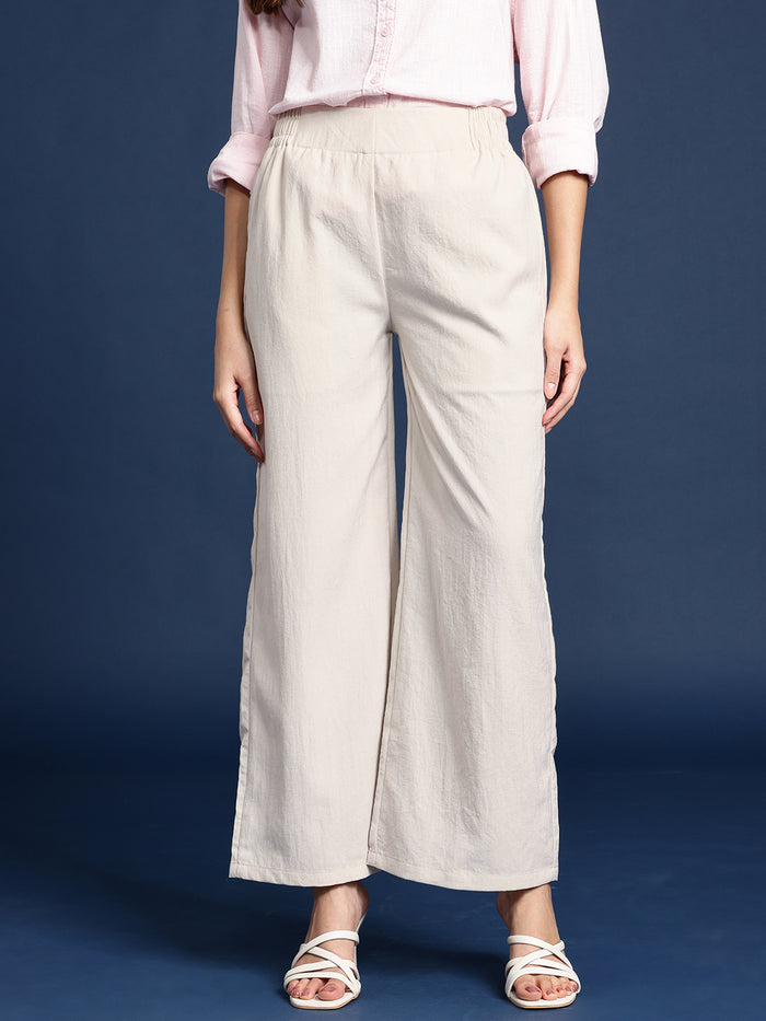 Women’s elasticated waist wide-leg trousers by Fithub Fashion, showing the flowy fabric and relaxed fit on a model.